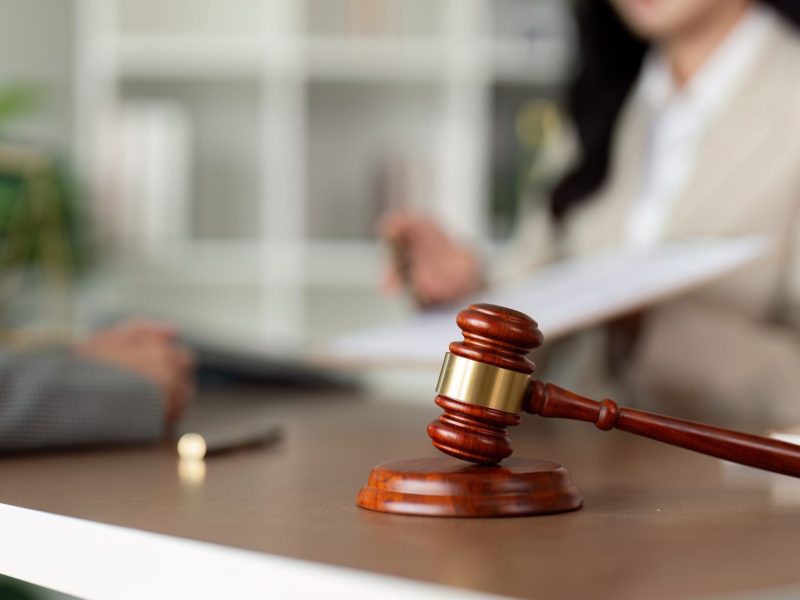 Consultation and conference of lawyer and business people discussion at law firm in office. Concepts of law, Judge gavel with scales of justice.